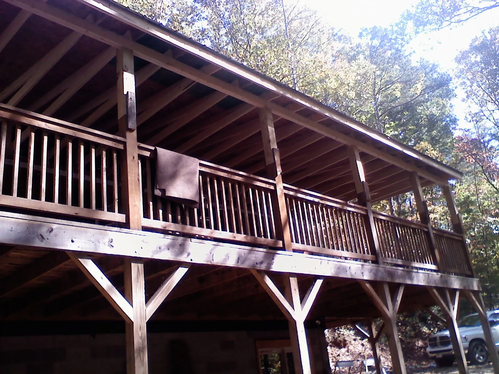 Timber framing under a new elevated porch and deck — Roof Leak Repair in Rice by Roofing Brothers